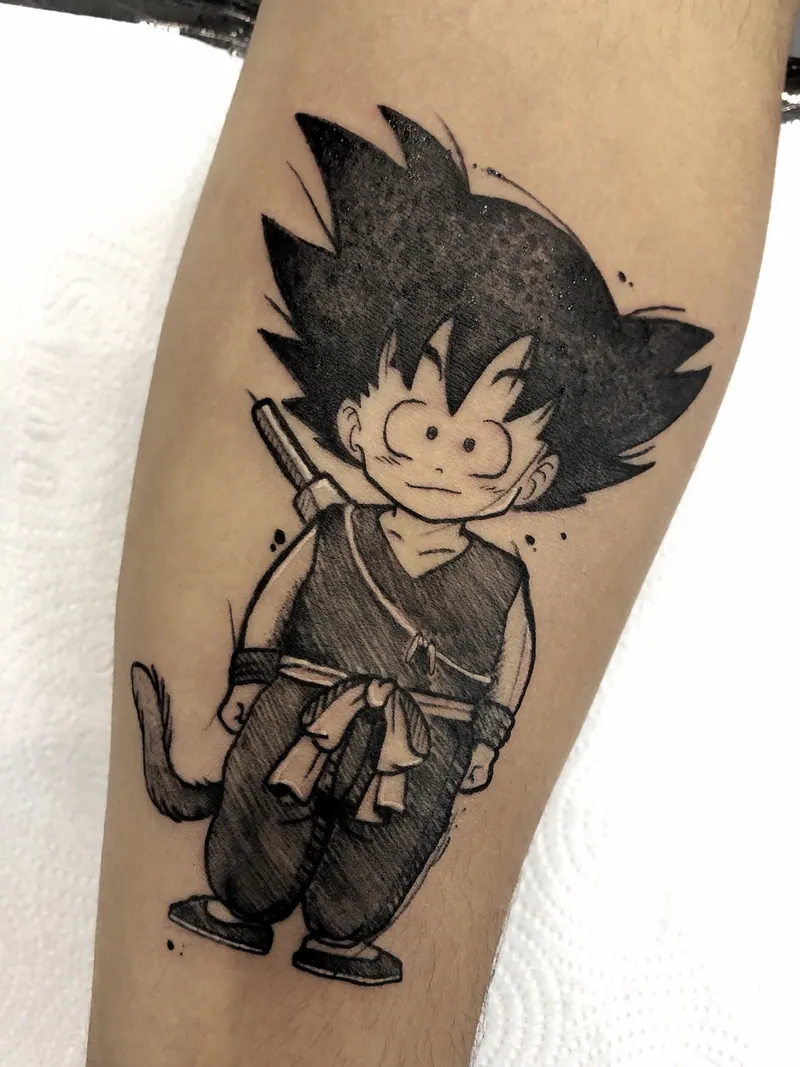 Tatuagem do Goku criança (Dragon Ball) em blackwork, panturrilha, uma sessão